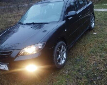 Черный Мазда 3, объемом двигателя 1.6 л и пробегом 242 тыс. км за 4200 $, фото 1 на Automoto.ua