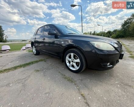 Черный Мазда 3, объемом двигателя 1.6 л и пробегом 289 тыс. км за 3900 $, фото 1 на Automoto.ua