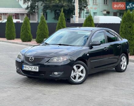 Черный Мазда 3, объемом двигателя 1.6 л и пробегом 186 тыс. км за 5750 $, фото 1 на Automoto.ua