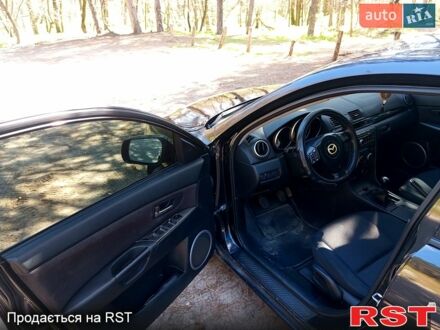 Черный Мазда 3, объемом двигателя 1.6 л и пробегом 257 тыс. км за 4000 $, фото 1 на Automoto.ua