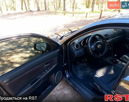 Черный Мазда 3, объемом двигателя 1.6 л и пробегом 257 тыс. км за 4000 $, фото 1 на Automoto.ua