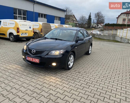 Черный Мазда 3, объемом двигателя 1.6 л и пробегом 172 тыс. км за 4999 $, фото 1 на Automoto.ua