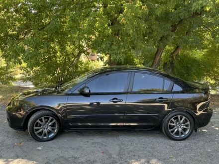 Чорний Мазда 3, об'ємом двигуна 1.6 л та пробігом 299 тис. км за 5200 $, фото 1 на Automoto.ua
