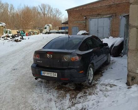 Черный Мазда 3, объемом двигателя 2 л и пробегом 288 тыс. км за 2800 $, фото 1 на Automoto.ua