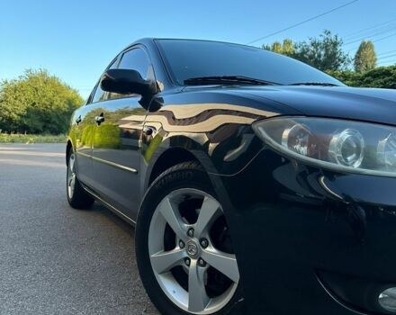 Чорний Мазда 3, об'ємом двигуна 1.6 л та пробігом 201 тис. км за 6000 $, фото 1 на Automoto.ua