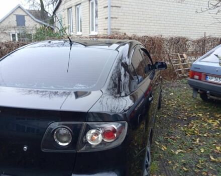 Черный Мазда 3, объемом двигателя 1.6 л и пробегом 165 тыс. км за 4500 $, фото 1 на Automoto.ua