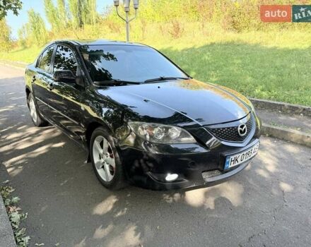 Черный Мазда 3, объемом двигателя 1.6 л и пробегом 285 тыс. км за 4599 $, фото 1 на Automoto.ua