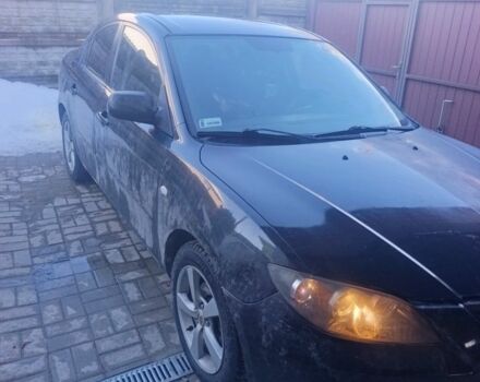 Черный Мазда 3, объемом двигателя 2 л и пробегом 140 тыс. км за 2400 $, фото 1 на Automoto.ua