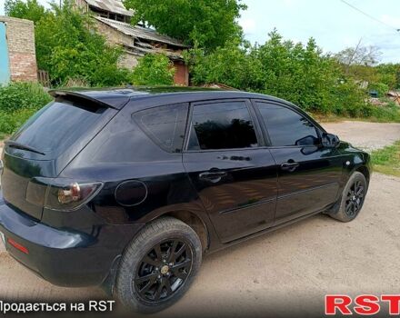 Черный Мазда 3, объемом двигателя 1.6 л и пробегом 155 тыс. км за 5200 $, фото 1 на Automoto.ua