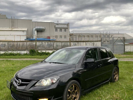 Черный Мазда 3, объемом двигателя 2.26 л и пробегом 353 тыс. км за 7000 $, фото 1 на Automoto.ua