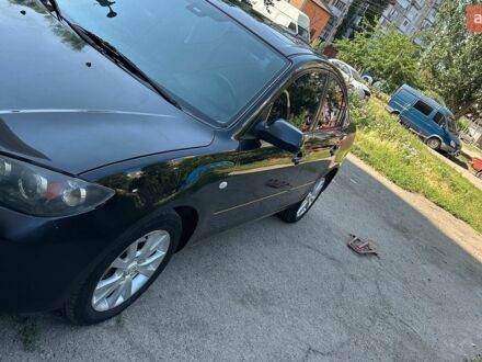 Чорний Мазда 3, об'ємом двигуна 1.6 л та пробігом 203 тис. км за 5300 $, фото 1 на Automoto.ua