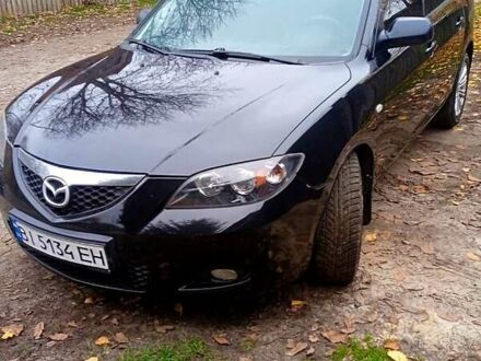 Черный Мазда 3, объемом двигателя 2 л и пробегом 240 тыс. км за 5600 $, фото 1 на Automoto.ua