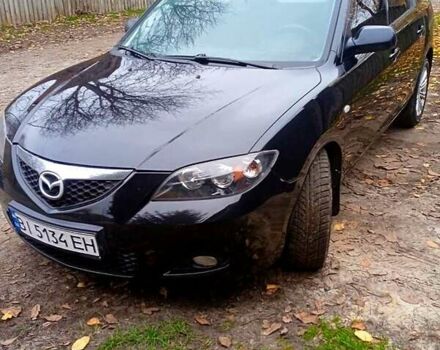 Черный Мазда 3, объемом двигателя 2 л и пробегом 240 тыс. км за 5600 $, фото 1 на Automoto.ua
