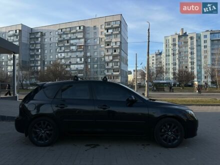 Черный Мазда 3, объемом двигателя 2 л и пробегом 154 тыс. км за 6200 $, фото 1 на Automoto.ua