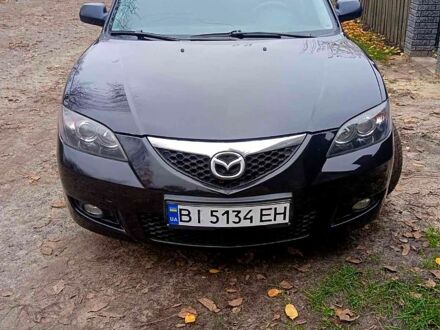 Черный Мазда 3, объемом двигателя 2 л и пробегом 240 тыс. км за 5600 $, фото 1 на Automoto.ua