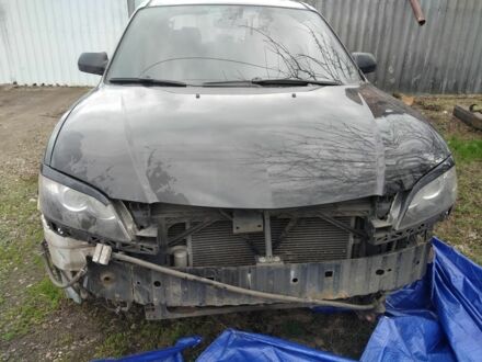 Чорний Мазда 3, об'ємом двигуна 2 л та пробігом 300 тис. км за 1300 $, фото 1 на Automoto.ua