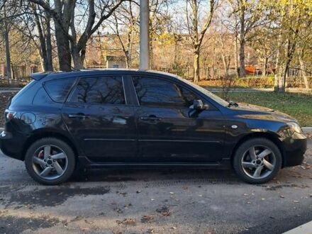 Черный Мазда 3, объемом двигателя 1.56 л и пробегом 233 тыс. км за 5200 $, фото 1 на Automoto.ua