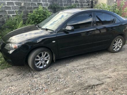 Черный Мазда 3, объемом двигателя 2 л и пробегом 119 тыс. км за 8000 $, фото 1 на Automoto.ua