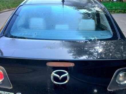 Чорний Мазда 3, об'ємом двигуна 1.6 л та пробігом 247 тис. км за 4200 $, фото 1 на Automoto.ua