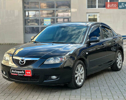 Черный Мазда 3, объемом двигателя 1.6 л и пробегом 232 тыс. км за 6740 $, фото 1 на Automoto.ua
