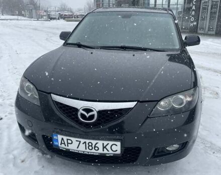 Черный Мазда 3, объемом двигателя 1.6 л и пробегом 200 тыс. км за 5600 $, фото 1 на Automoto.ua