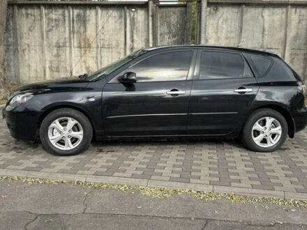 Чорний Мазда 3, об'ємом двигуна 1.6 л та пробігом 215 тис. км за 5850 $, фото 1 на Automoto.ua