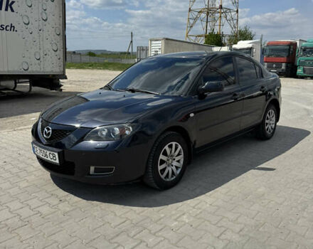 Черный Мазда 3, объемом двигателя 1.6 л и пробегом 268 тыс. км за 5100 $, фото 1 на Automoto.ua