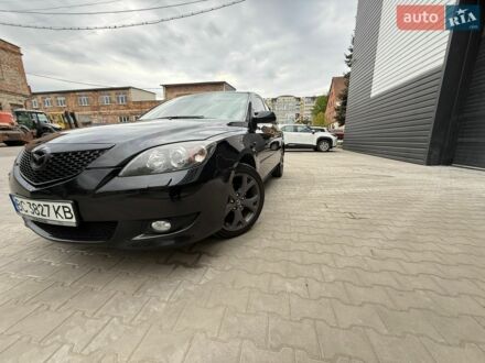 Черный Мазда 3, объемом двигателя 1.6 л и пробегом 207 тыс. км за 5600 $, фото 1 на Automoto.ua