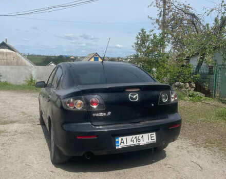 Чорний Мазда 3, об'ємом двигуна 1.6 л та пробігом 210 тис. км за 6000 $, фото 1 на Automoto.ua