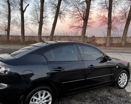 Черный Мазда 3, объемом двигателя 1.6 л и пробегом 153 тыс. км за 6200 $, фото 1 на Automoto.ua