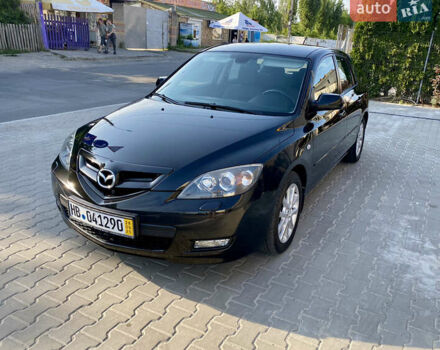 Черный Мазда 3, объемом двигателя 1.6 л и пробегом 165 тыс. км за 5599 $, фото 1 на Automoto.ua