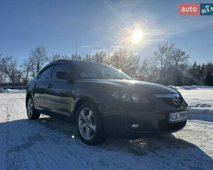 Черный Мазда 3, объемом двигателя 1.6 л и пробегом 210 тыс. км за 5700 $, фото 1 на Automoto.ua