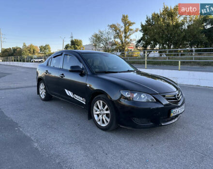 Черный Мазда 3, объемом двигателя 2 л и пробегом 200 тыс. км за 2950 $, фото 1 на Automoto.ua