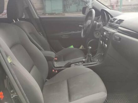 Черный Мазда 3, объемом двигателя 2 л и пробегом 226 тыс. км за 5700 $, фото 1 на Automoto.ua