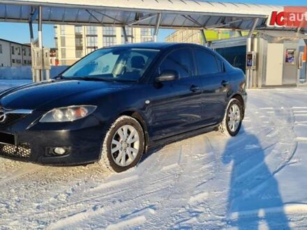 Черный Мазда 3, объемом двигателя 2 л и пробегом 255 тыс. км за 5000 $, фото 1 на Automoto.ua