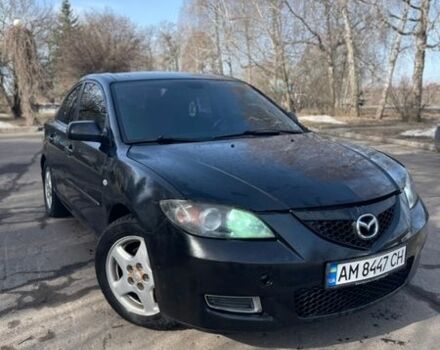 Черный Мазда 3, объемом двигателя 2 л и пробегом 220 тыс. км за 3650 $, фото 1 на Automoto.ua
