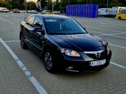Черный Мазда 3, объемом двигателя 1.6 л и пробегом 260 тыс. км за 4998 $, фото 1 на Automoto.ua