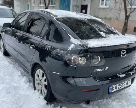 Черный Мазда 3, объемом двигателя 1.6 л и пробегом 235 тыс. км за 4000 $, фото 1 на Automoto.ua