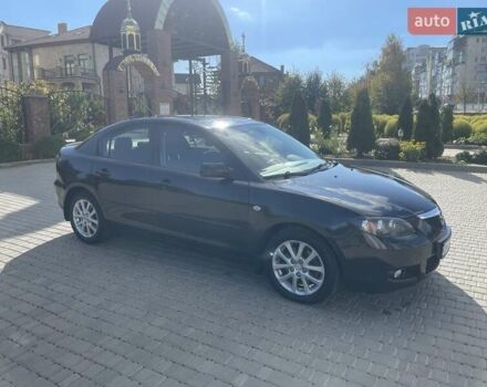 Черный Мазда 3, объемом двигателя 2 л и пробегом 175 тыс. км за 6000 $, фото 1 на Automoto.ua
