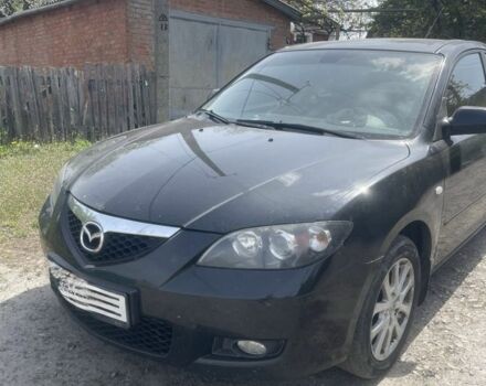 Черный Мазда 3, объемом двигателя 1.6 л и пробегом 210 тыс. км за 6500 $, фото 1 на Automoto.ua