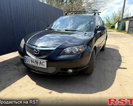 Черный Мазда 3, объемом двигателя 2 л и пробегом 322 тыс. км за 4330 $, фото 1 на Automoto.ua