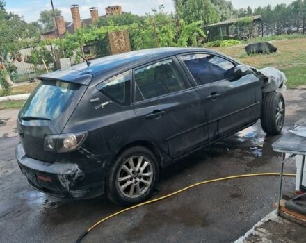 Черный Мазда 3, объемом двигателя 1.6 л и пробегом 300 тыс. км за 1000 $, фото 1 на Automoto.ua