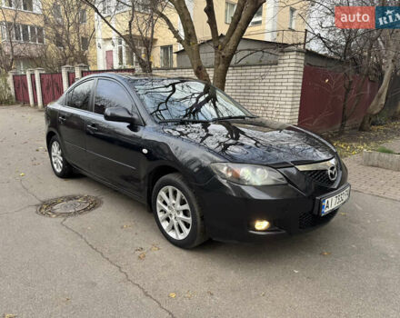 Черный Мазда 3, объемом двигателя 1.6 л и пробегом 255 тыс. км за 5650 $, фото 1 на Automoto.ua