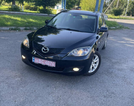 Черный Мазда 3, объемом двигателя 1.6 л и пробегом 259 тыс. км за 5300 $, фото 1 на Automoto.ua