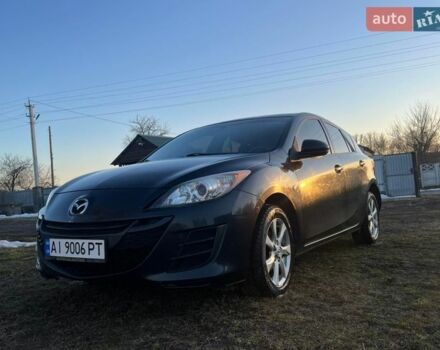 Чорний Мазда 3, об'ємом двигуна 1.56 л та пробігом 230 тис. км за 5400 $, фото 1 на Automoto.ua