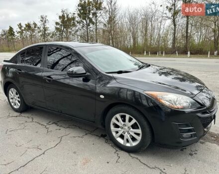 Черный Мазда 3, объемом двигателя 1.6 л и пробегом 165 тыс. км за 7650 $, фото 1 на Automoto.ua