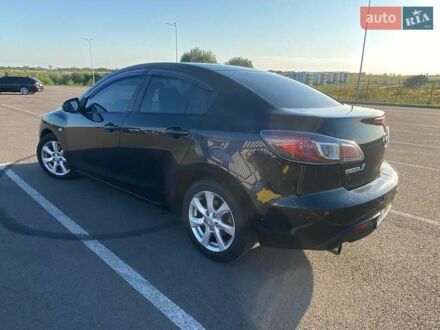 Чорний Мазда 3, об'ємом двигуна 2 л та пробігом 261 тис. км за 6900 $, фото 1 на Automoto.ua