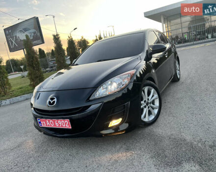 Черный Мазда 3, объемом двигателя 1.6 л и пробегом 213 тыс. км за 6900 $, фото 1 на Automoto.ua