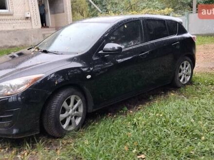 Черный Мазда 3, объемом двигателя 1.59 л и пробегом 170 тыс. км за 7250 $, фото 1 на Automoto.ua