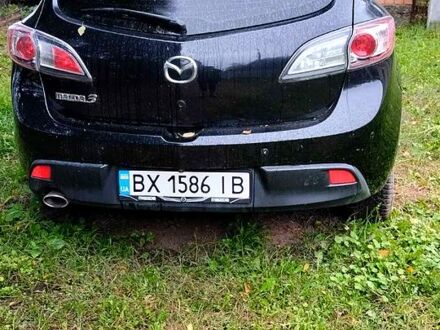 Черный Мазда 3, объемом двигателя 1.6 л и пробегом 180 тыс. км за 7000 $, фото 1 на Automoto.ua